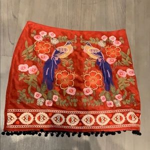 Suede embroidered mini skirt with fringe